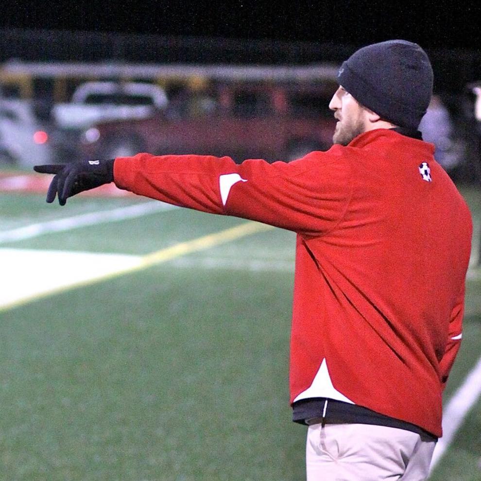 Andrew on the sideline, directing play